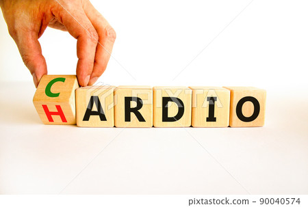 Cardio or hardio symbol. Businessman turns wooden cubes and changes concept words hardio to cardio. Beautiful white background. Sport, healthy lifestyle and cardio or hardio concept. Copy space. Cardio or hardio symbol. Businessman turns wooden cubes and changes concept words hardio to cardio. Beautiful white background. Sport, healthy lifestyle and cardio or hardio concept. Copy space. 90040574
