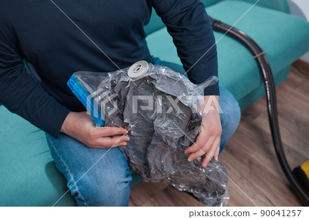 Space saver saving seal bag sucking air vacuum clothing storage compressed package. Space saver saving seal bag sucking air vacuum clothing storage compressed package. 90041257