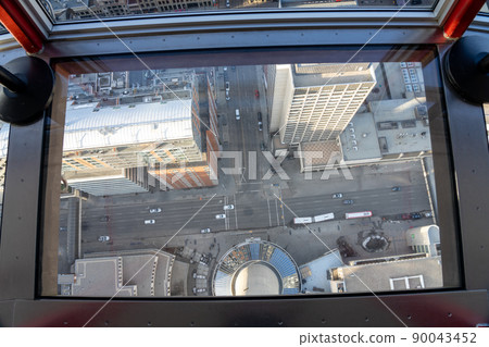 Calgary, AB, Canada - March 14 2022 : Interior lobby the observation deck of Calgary Tower. Calgary, AB, Canada - March 14 2022 : Interior lobby the observation deck of Calgary Tower. 90043452