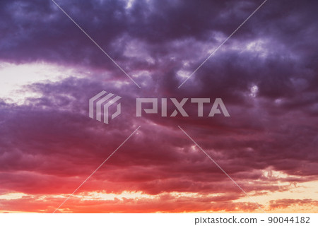 Amazing cloudscape on the sky at sunset time. Amazing cloudscape on the sky at sunset time. 90044182