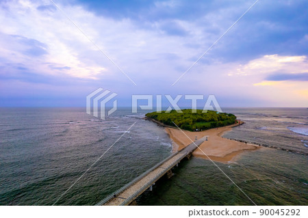 Fantastic morning aerial shot with a drone Aoshima, Miyazaki Prefecture, Aoshima Shrine, and a demon's washing board 90045292