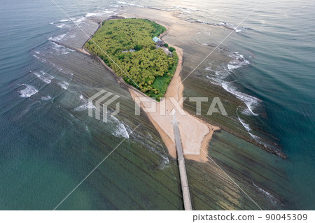 Fantastic morning aerial shot with a drone Aoshima, Miyazaki Prefecture, Aoshima Shrine, and a demon's washing board 90045309