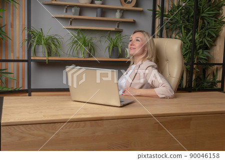 The girl at the computer business lady, the concept of a torgitologist gender equality job shopping freelance worker online, from work laptop from using from adult animals, hands cute. Caucasian girl The girl at the computer business lady, the concept of a torgitologist gender equality job shopping freelance worker online, from work laptop from using from adult animals, hands cute. Caucasian girl 90046158