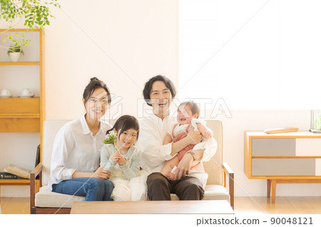Happy family indoors Happy family indoors 90048121
