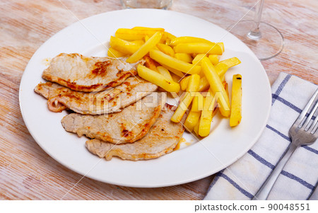 Fried barbecue pork meat with baked potato Fried barbecue pork meat with baked potato 90048551