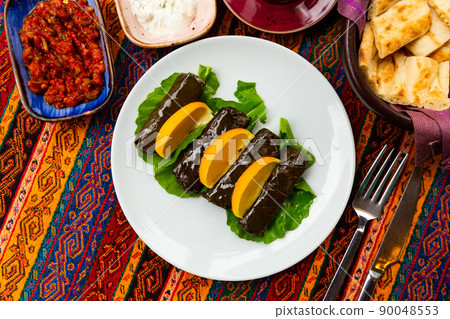 Turkish sarma from vine leaves filled with rice 90048553