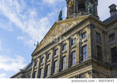 View of Royal Palace Amsterdam in winter time in Amsterdam, Netherlands. 90050645