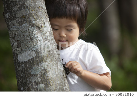 Children collecting insects Children collecting insects 90051010
