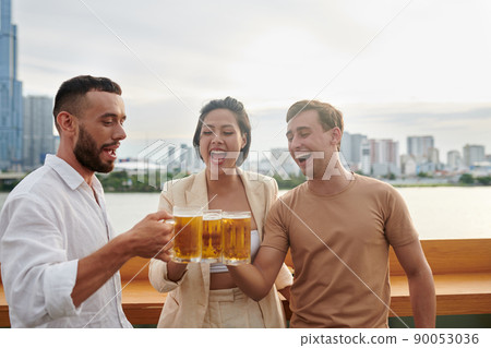 Friends Hanging out in Rooftop Bar 90053036