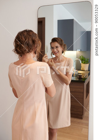 Happy Woman Styling Hair Happy Woman Styling Hair 90053329