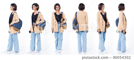 Full length of Asian Indian 20s working woman with curl hair hold cell smart phone backpack blazzer 90054302