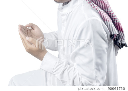 Muslim man with keffiyeh with agal raised hands and praying Muslim man with keffiyeh with agal raised hands and praying 90061730