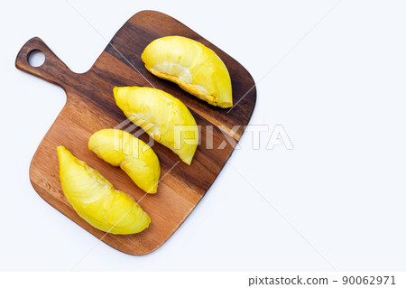 Durian on wooden cutting board Durian on wooden cutting board 90062971
