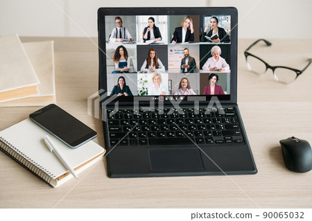 Distance management. Video conference. Corporate network. Business team working online on laptop screen at home digital office workplace. Distance management. Video conference. Corporate network. Business team working online on laptop screen at home digital office workplace. 90065032