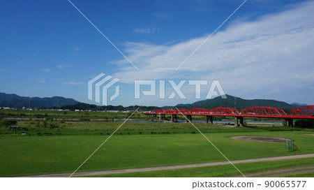 Red Mima Bridge that shines in the green of nature [Tokushima, Japan] 90065577