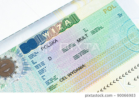 Fragment of Schengen multi entrance Polish visa in passport close-up. Fragment of Schengen multi entrance Polish visa in passport close-up. 90066983