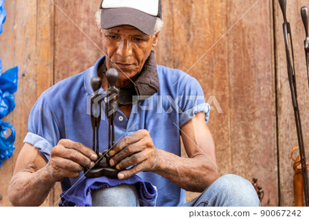 old afro american artisan working in wood sculptures old afro american artisan working in wood sculptures 90067242