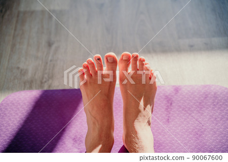 Fitness sport woman in fashion sportswear doing yoga fitness exercise in the city street over gray concrete background. Outdoor sports clothing and shoes, urban style. Tie sneakers, top view. Fitness sport woman in fashion sportswear doing yoga fitness exercise in the city street over gray concrete background. Outdoor sports clothing and shoes, urban style. Tie sneakers, top view. 90067600