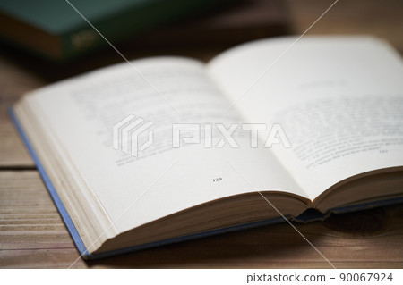 Reading foreign books on the desk Reading foreign books on the desk 90067924