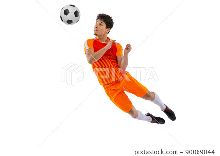 Professional football, soccer player in motion isolated on white studio background. Concept of sport, match, active lifestyle, goal and hobby Professional football, soccer player in motion isolated on white studio background. Concept of sport, match, active lifestyle, goal and hobby 90069044