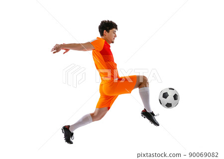 Professional football, soccer player in motion isolated on white studio background. Concept of sport, match, active lifestyle, goal and hobby 90069082