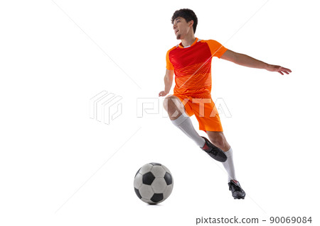 Professional football, soccer player in motion isolated on white studio background. Concept of sport, match, active lifestyle, goal and hobby 90069084
