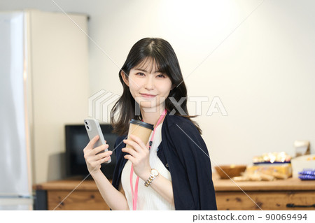 Business woman taking a break and relaxing Business woman taking a break and relaxing 90069494