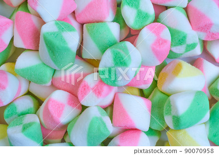 Background or texture of colorful blue and pink marshmallows.Multi-colored marshmallows. Background or texture of colorful blue and pink marshmallows.Multi-colored marshmallows. 90070958