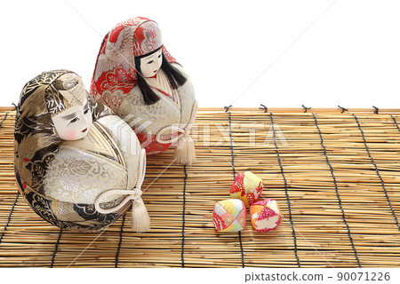 A beanbag placed on a bamboo blind woven from bamboo 1 90071226