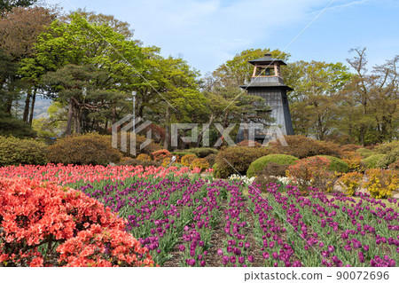 Numata Castle bell turret and tulips Numata Castle bell turret and tulips 90072696