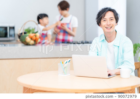 A man doing telework in the living room 90072979