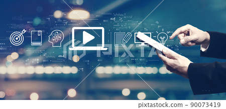 Webinar concept with businessman using a tablet 90073419