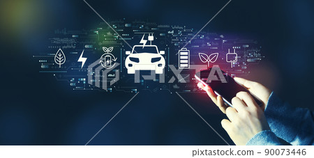 EV concept with person using smartphone EV concept with person using smartphone 90073446