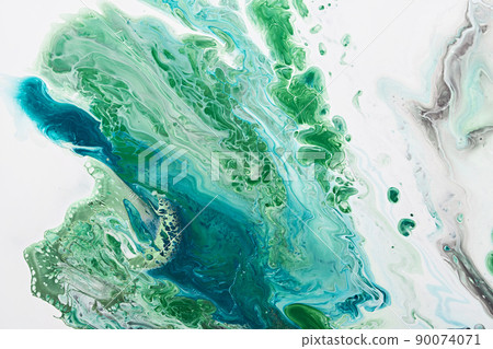 Fluid Art acrylic paints. Abstract mixing blue and green waves on white background. Liquid flows splashes. Marble effect background or texture 90074071