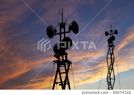 Air defense radars of military mobile anti aircraft systems, modern army industry on the background of the sunset orange sky, Russia 90074188