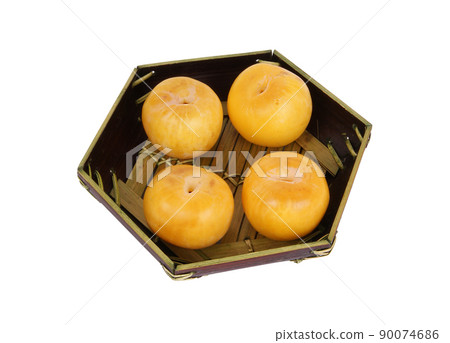 Yellow plums on plate, isolated on a white background Yellow plums on plate, isolated on a white background 90074686