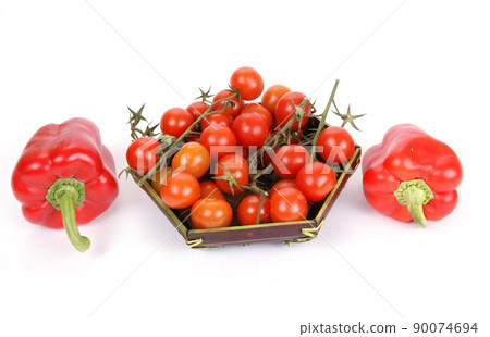 cherry tomato and red pepper, on a white background cherry tomato and red pepper, on a white background 90074694