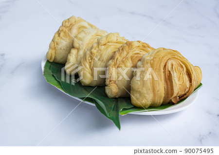 Malaysia popular and traditional snack Karipap filled with potato fillings. 90075495