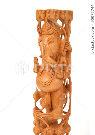 Deity god of wisdom and prosperity Ganesha from India on a white background, wood 90075744