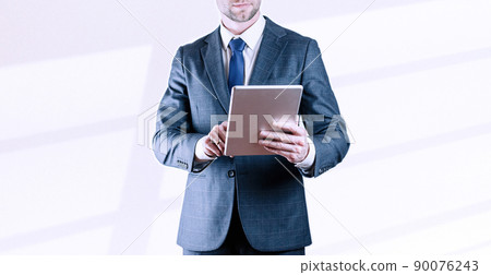 Holding tablet business. Businessman analyzing economic growth graph chart and data sales on white. Digital marketing technology banner. 90076243