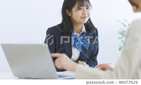 Female students interviewing at a cram school High school students Junior high school students Female students interviewing at a cram school High school students Junior high school students 90077629