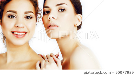 young pretty multiethnic woman posing together cheerful isolated on white background, asian and caucasian diversity in people, cosmetic concept close up 90077989