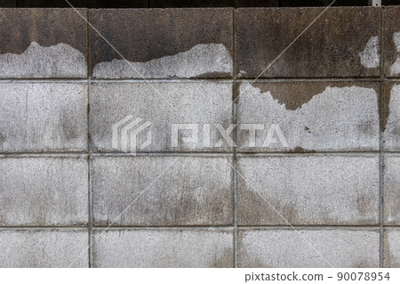 Gray block wall wet in the rain Gray block wall wet in the rain 90078954