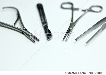Surgical Instruments Isolated on the White Background Surgical Instruments Isolated on the White Background 90079005