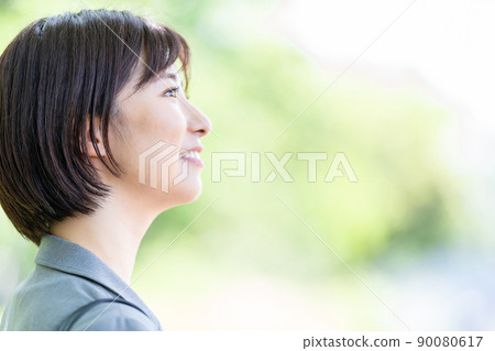 Female business woman in a suit Female business woman in a suit 90080617