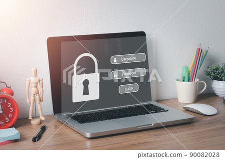 Laptop computer on office desk with login and password on screen display, cyber security concept, data protection and secured internet access... Laptop computer on office desk with login and password on screen display, cyber security concept, data protection and secured internet access... 90082028