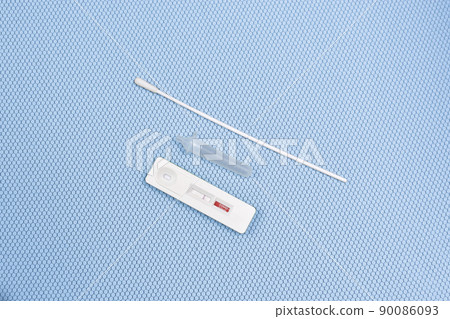 Antigen test kit (ATK) Covid-19 negative test result on light blue color background 90086093