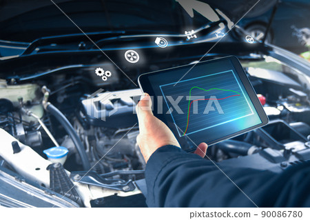 Auto mechanic is checking engine system with a ODB2 tablet and auto service icon Auto mechanic is checking engine system with a ODB2 tablet and auto service icon 90086780
