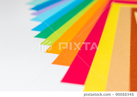 Colorful paper piled up on the table 90088348