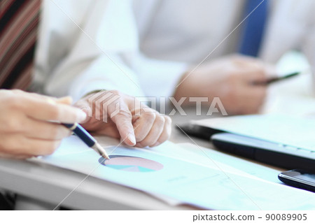 closeup. professional business team discussing marketing data 90089905
